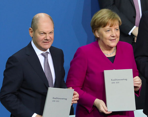 Angela Merkel und Olaf Scholz